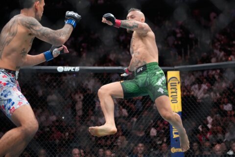 Conor McGregor suffers early knee injury in return, loses to Max Holloway at UFC 329