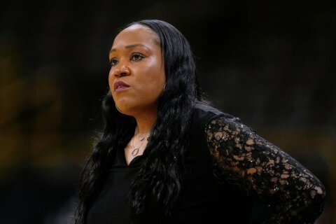 Virginia and coach Amaka Agugua-Hamilton reach a settlement after her sudden dismissal