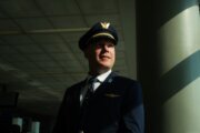 United Airlines First Officer Netanel Draiblate poses for a portrait at Terminal C of Newark Liberty International Airport. He became a commercial airline pilot after encouragement from a flight instructor who helped him learn how to navigate two careers.