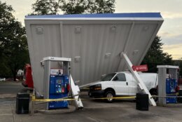 Gas station canopy toppled