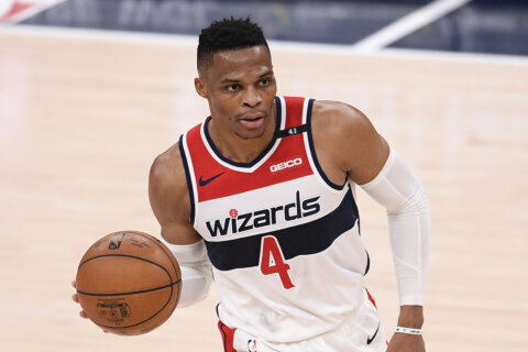 Washington Wizards guard Russell Westbrook (4) dribbles the ball during the first half of an NBA basketball game against the Chicago Bulls, Tuesday, Dec. 29, 2020, in Washington. (AP Photo/Nick Wass)