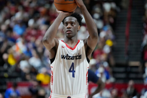 Washington Wizards' AJ Dybantsa shoots against the Sacramento Kings during the first half of an NBA Summer League basketball game Sunday, July 12, 2026, in Las Vegas. (AP Photo/John Locher)
