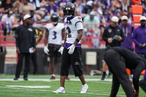 Ravens cornerback Nate Wiggins carted off with left leg injury