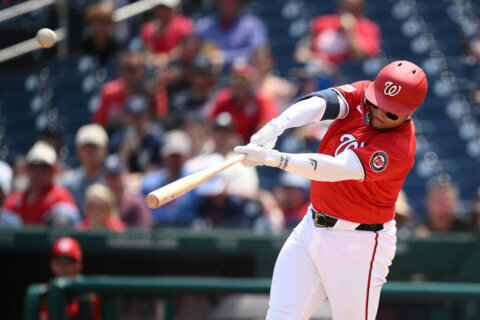 Ortiz hits 2nd career homer, Dion leads strong bullpen outing as Nationals beat Reds 7-1