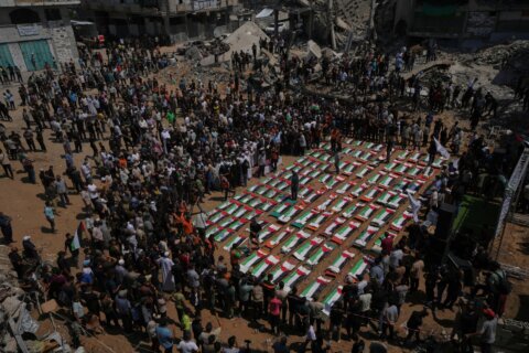 Palestinians hold mass funeral for 112 bodies finally recovered from a 2023 Gaza strike