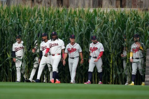 Field of Dreams becomes the Hall of Fame, as 26 members come out of the corn for Phillies-Twins game