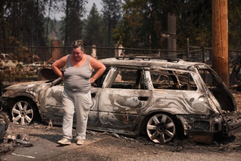 Firefighters get a handle on Spokane wildfires as tens of thousands remain evacuated
