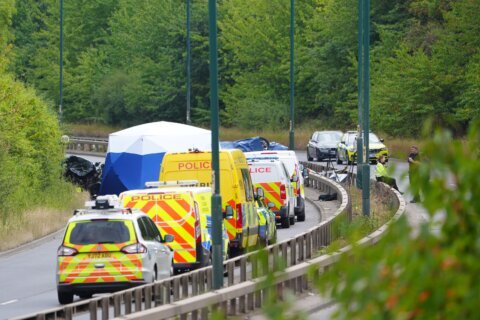A head-on collision in northeast England kills 7 people, including 2 police officers