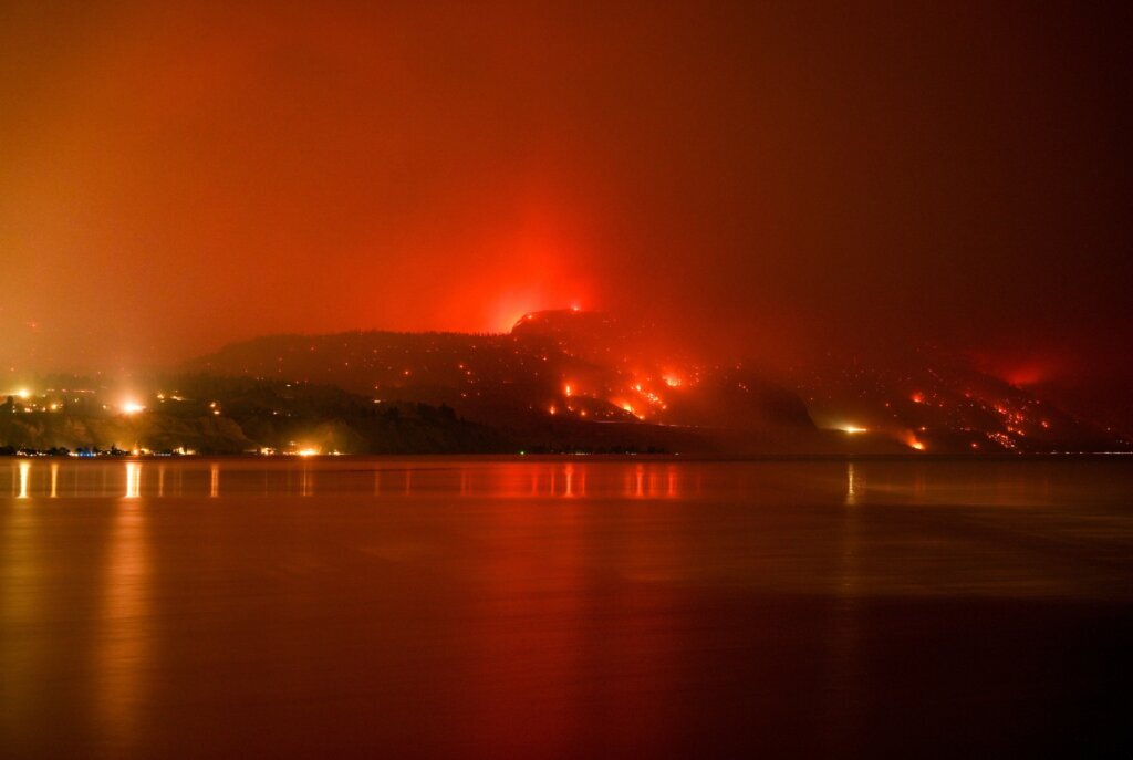 British Columbia wildfire that has forced 20,000 to flee grew overnight, officials say