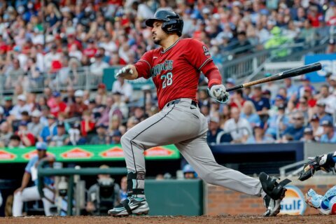 Arizona third baseman Arenado worried after leaving loss to the Braves with left trunk discomfort