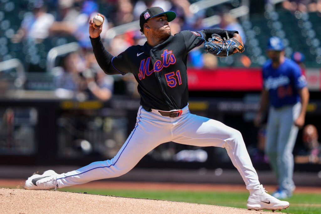Mets agree to trade pitcher Freddy Peralta to Rays for 3 minor leaguers, AP source says