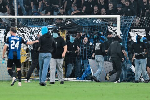 German Cup match marred by fireworks, pitch invasion