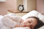 Child sleeping in bed