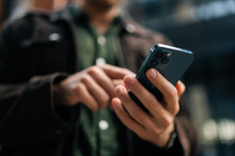 man using phone close up