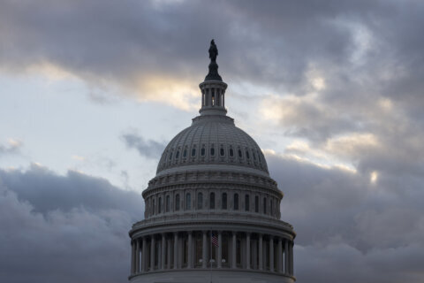 storm clouds loom over capitol rotunda