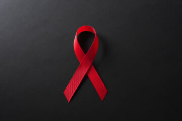 A red HIV/AIDS ribbon.