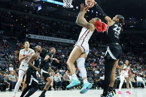 Aces secure playoff spot with 83-76 victory over the Mystics