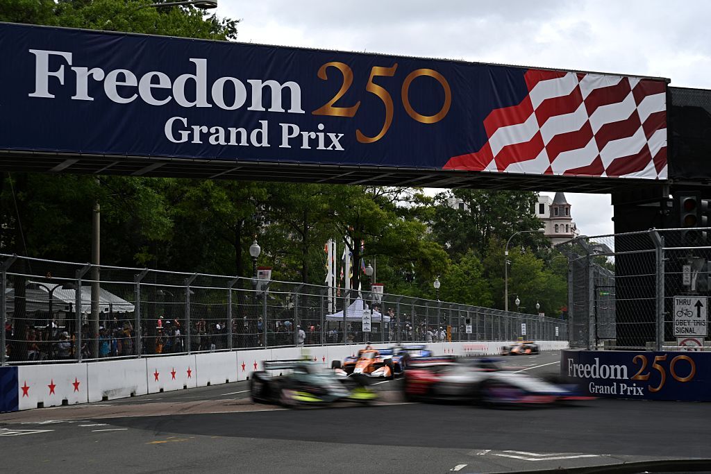 IndyCars take part in a practice session