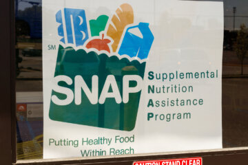 A Sign at a Retailer – We Accept SNAP IV