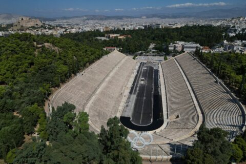 Athens is cleaning its all-marble Olympic stadium for the first time in more than a century