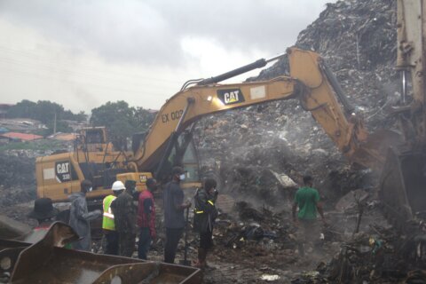 A landslide at a landfill in the capital of Guinea kills 30 people, officials say