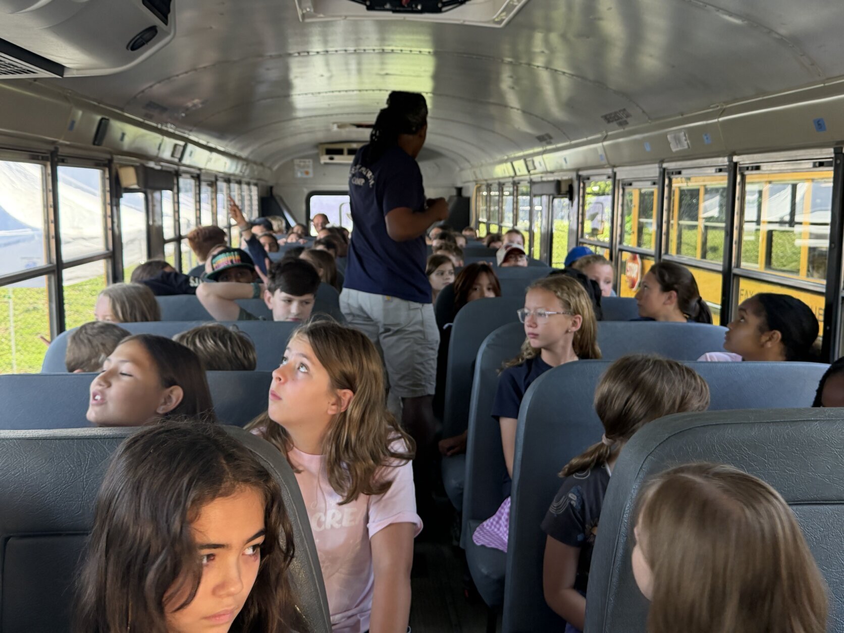students inside a school bus sitting