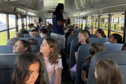 students inside a school bus sitting