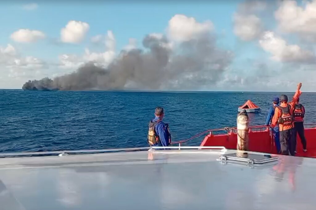 Rescuers evacuate more than 200 from a ferry fire that left at least 1 dead near Bali