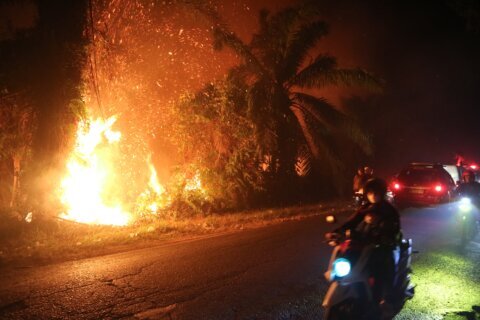 Indonesia intensifies aerial firefighting as wildfire haze spreads to Malaysia