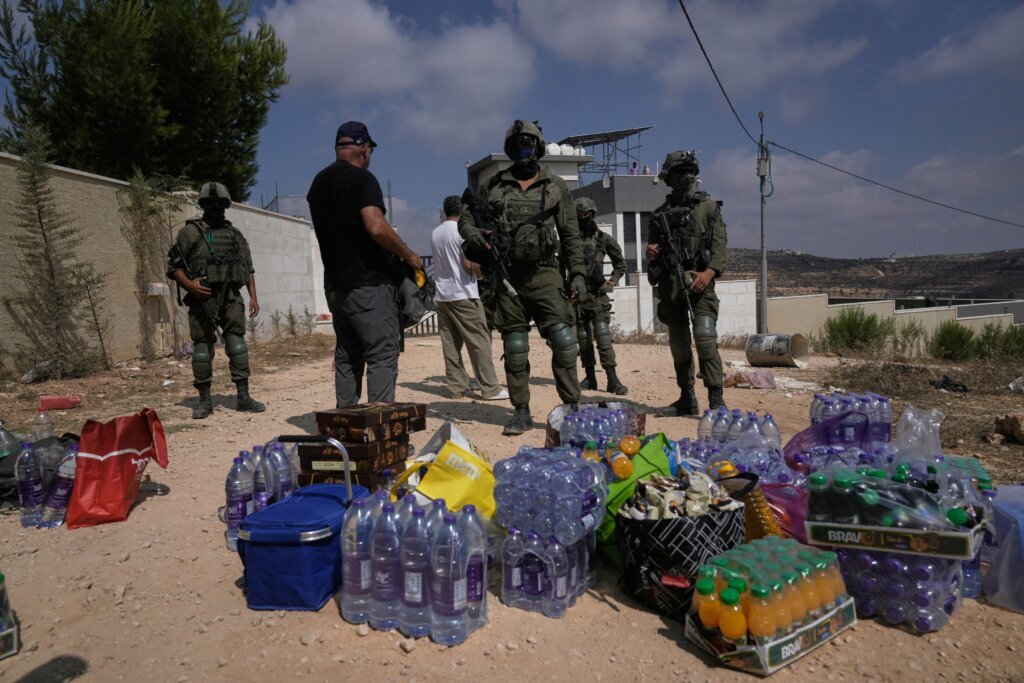 Palestinians besieged in West Bank village fear Israeli settlers will seize their homes