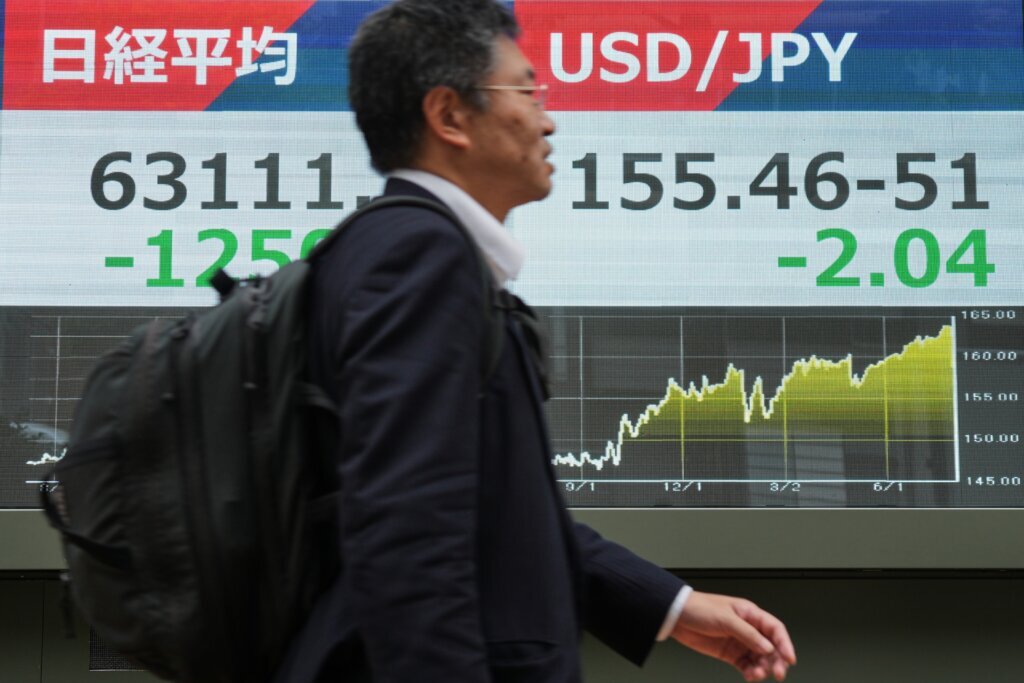 World stocks are mixed as yen jumps against the dollar, while oil prices slip