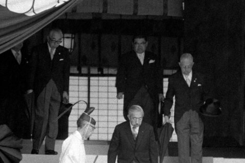 Japan’s Defense Minister Koizumi prays at shrine seen by neighbors as symbol of Japanese militarism