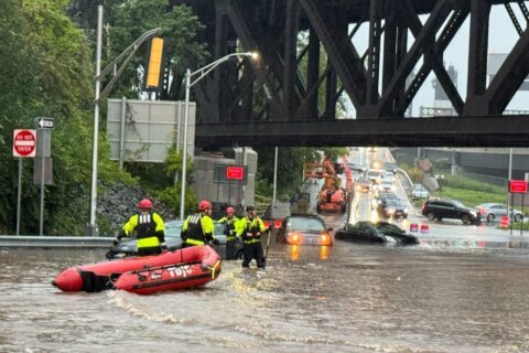 Storms and possible tornadoes pummel the Northeast US, flooding roads and damaging beaches