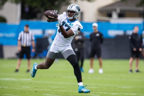 Panthers wide receiver Xavier Legette carted off the field with a stinger injury at training camp
