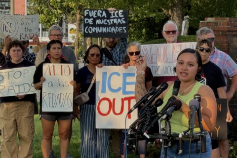 ‘This guy’s really pointing a gun at my head’: Woman speaks out after viral ICE video