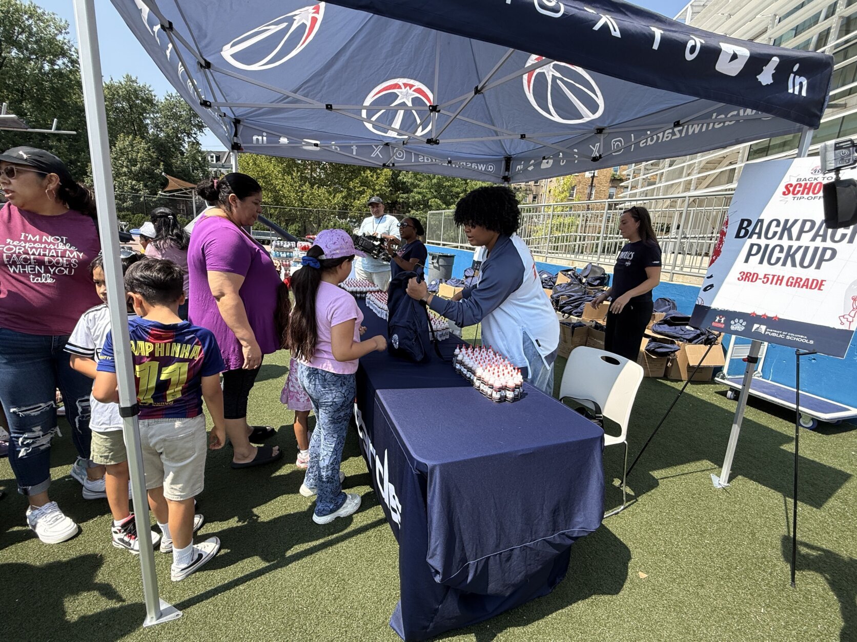 Wizards back-to-school party at Powell Bilingual Elementary School