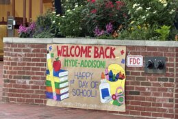 sign welcoming kids back to school