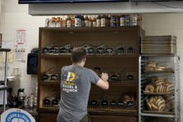 An employee at DePaola’s Bagel and Brunch