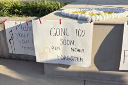 "Gone too soon, but never forgotten" sign