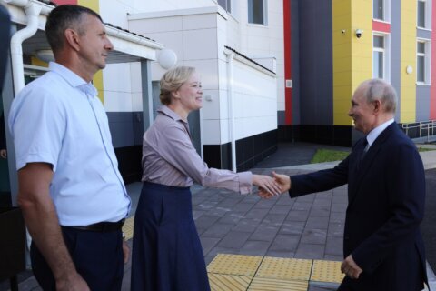 Putin’s first trip to the Pacific island chain claimed by Japan draws a protest from Tokyo