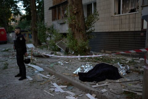 Russian missile barrage across Ukraine’s capital kills at least 12 and wounds 33