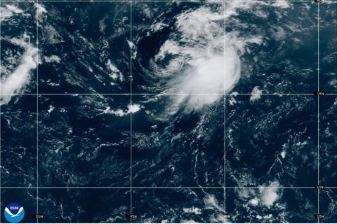 Forecasters warn a Pacific system could soak Hawaii as Tropical Storm Cristobal fades