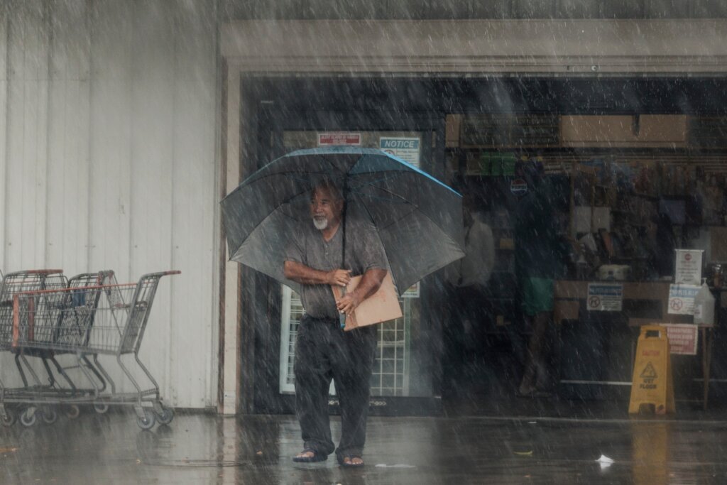 Lala is again a tropical storm, sending drenching rain and winds across the Hawaiian islands