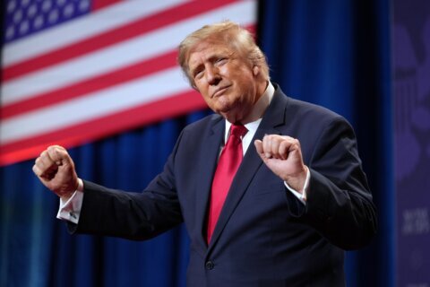 FACT FOCUS:  Trump boasts about the economy but there’s more to the story