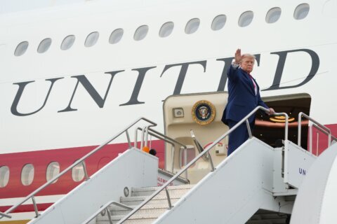 The Latest: Trump says he was taken off Air Force One last month due to threat