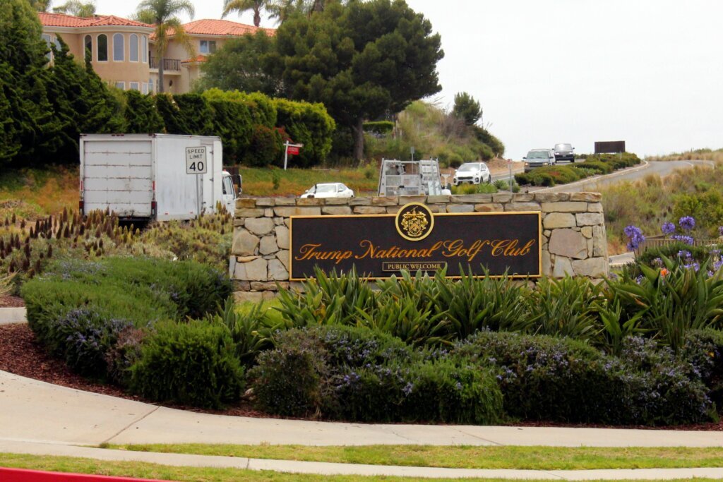Authorities say a man carrying ammo was monitoring security at Trump golf course near LA
