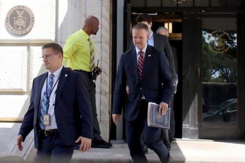 The Latest: Trump says US and Canada reached deal to delay US tariffs on Canadian imports