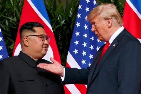 The Latest: Trump orders Pentagon to scale back joint exercises with South Korea