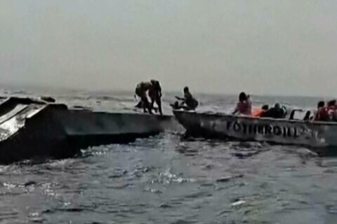 Survivors describe pleading to turn back before ferry capsized on Zimbabwe lake and killed 44